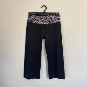 Black & zebra flare capri leggings.